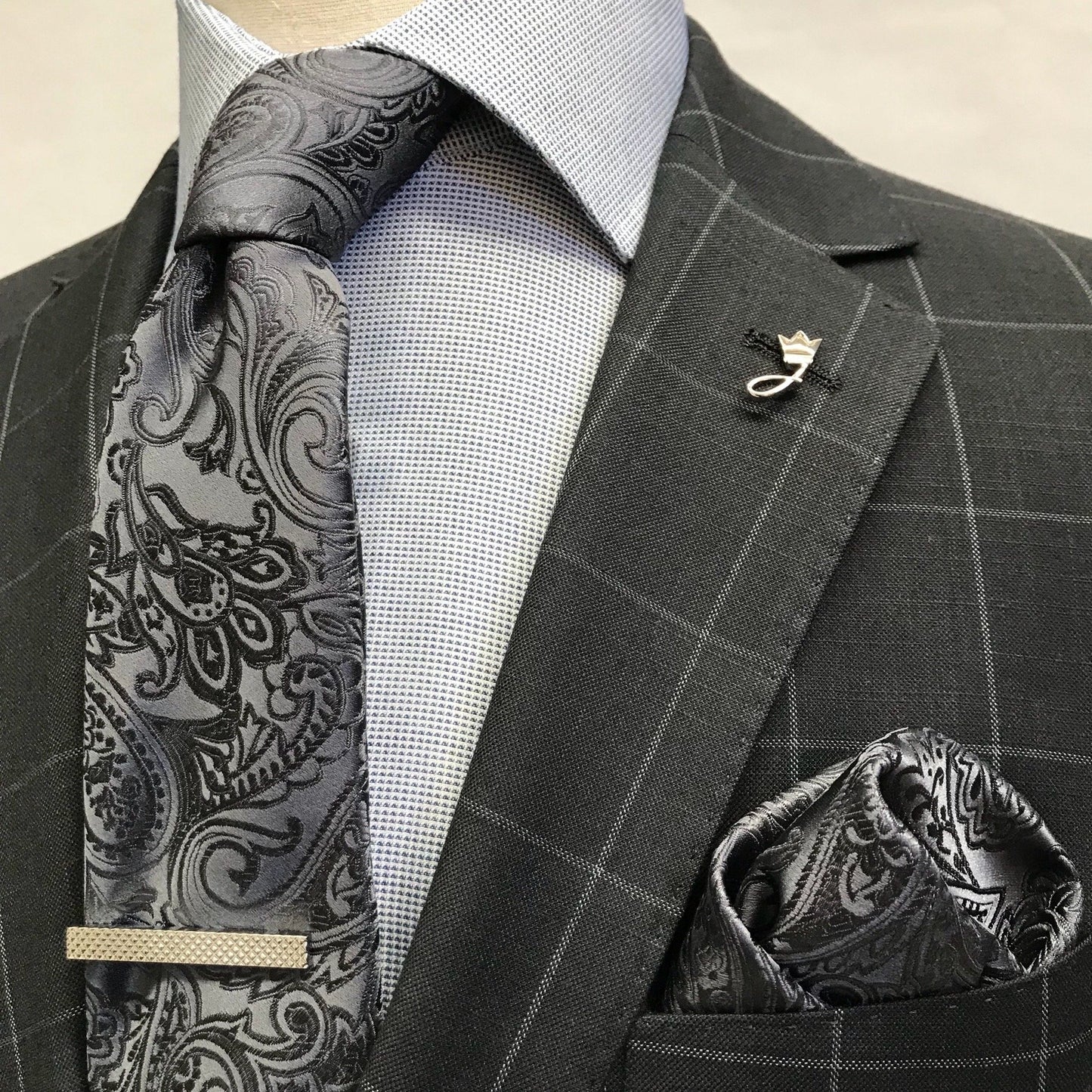 a charcoal and white checked sports jacket