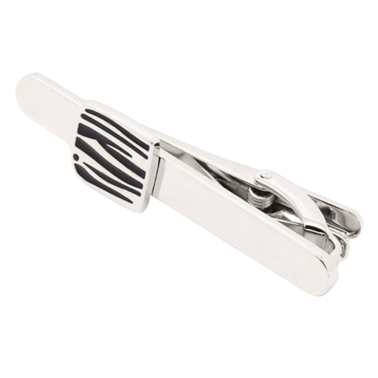 mens tie clip in silver chrome with a black and silver design on the clip