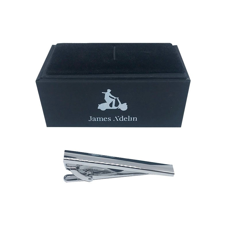 james adelin silver tie clip next to a black gift box